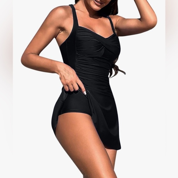 Elegant Black Swim Dress
Built in brief,quick drying
supportive tummy control - Picture 2 of 4